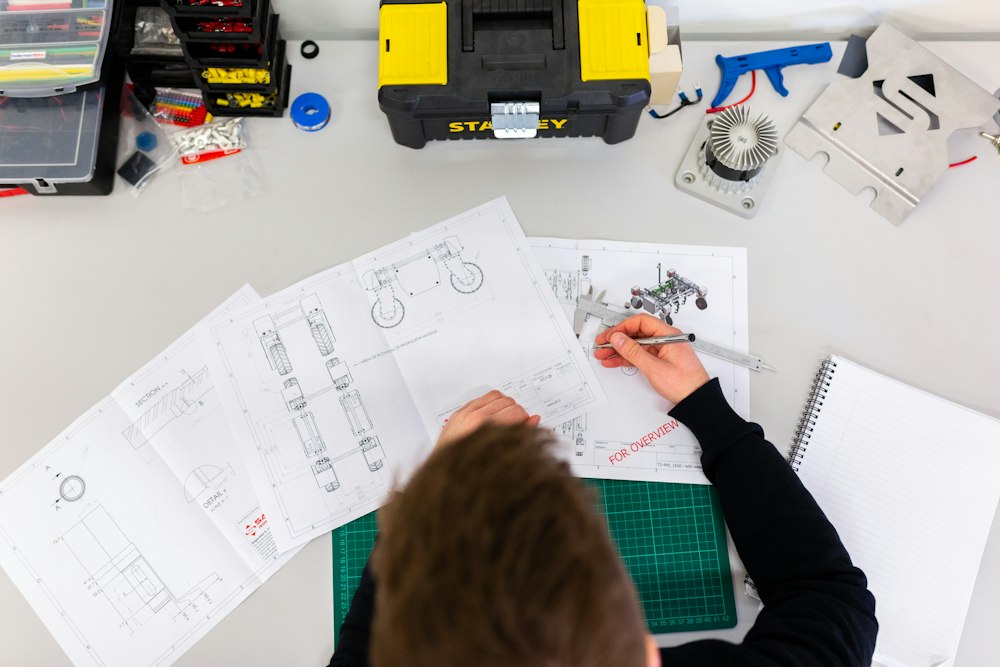 Precision engineer calibrating linear actuator